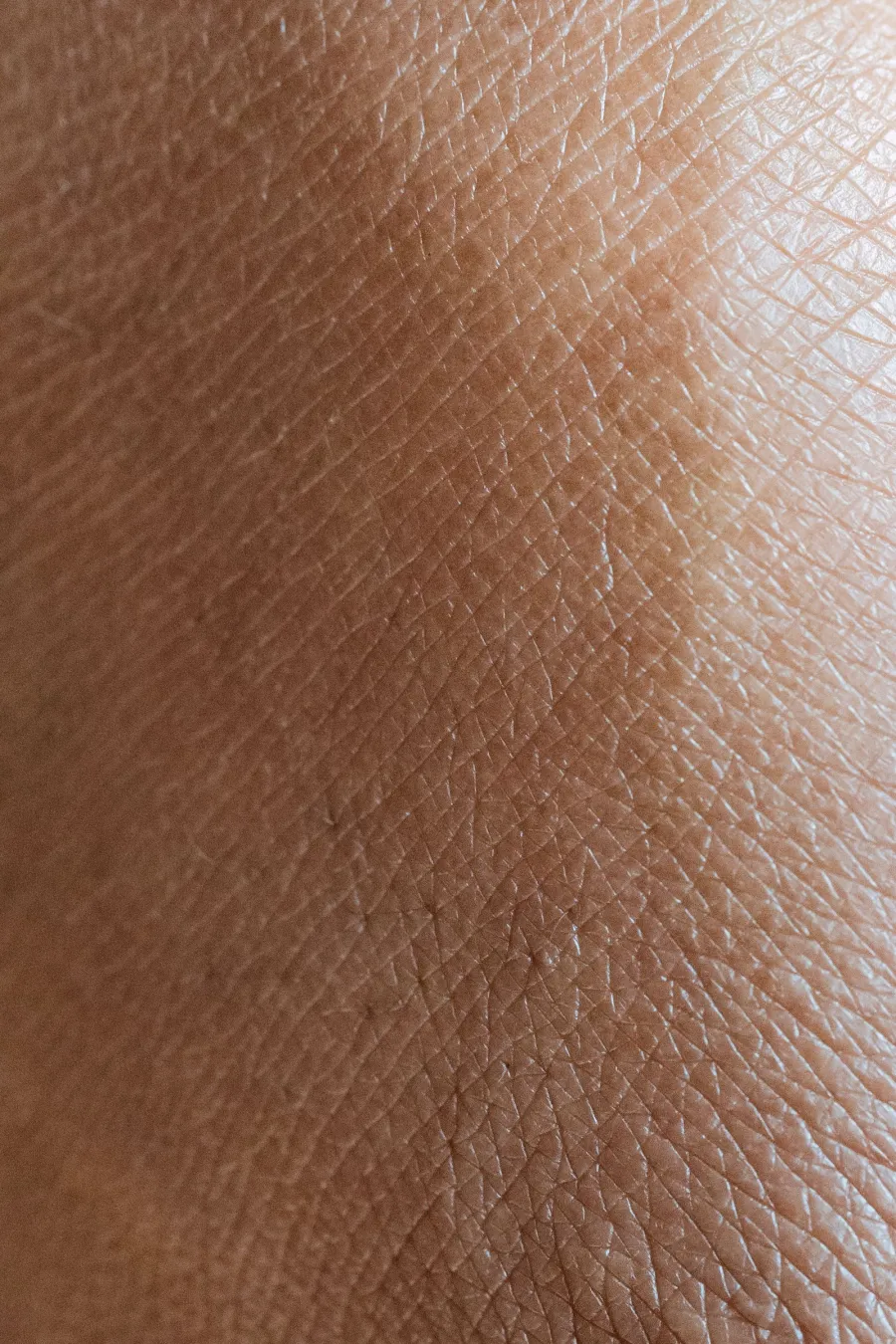 Close-up of smooth skin in natural light, illustrative image
