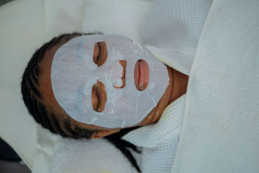 Person enjoying a facial treatment, illustrative image