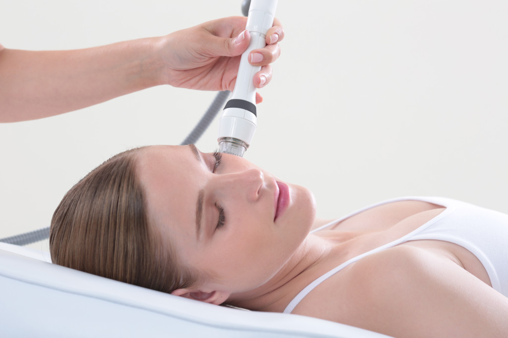 Woman getting a RFMN treatment | Dermatology of Seattle