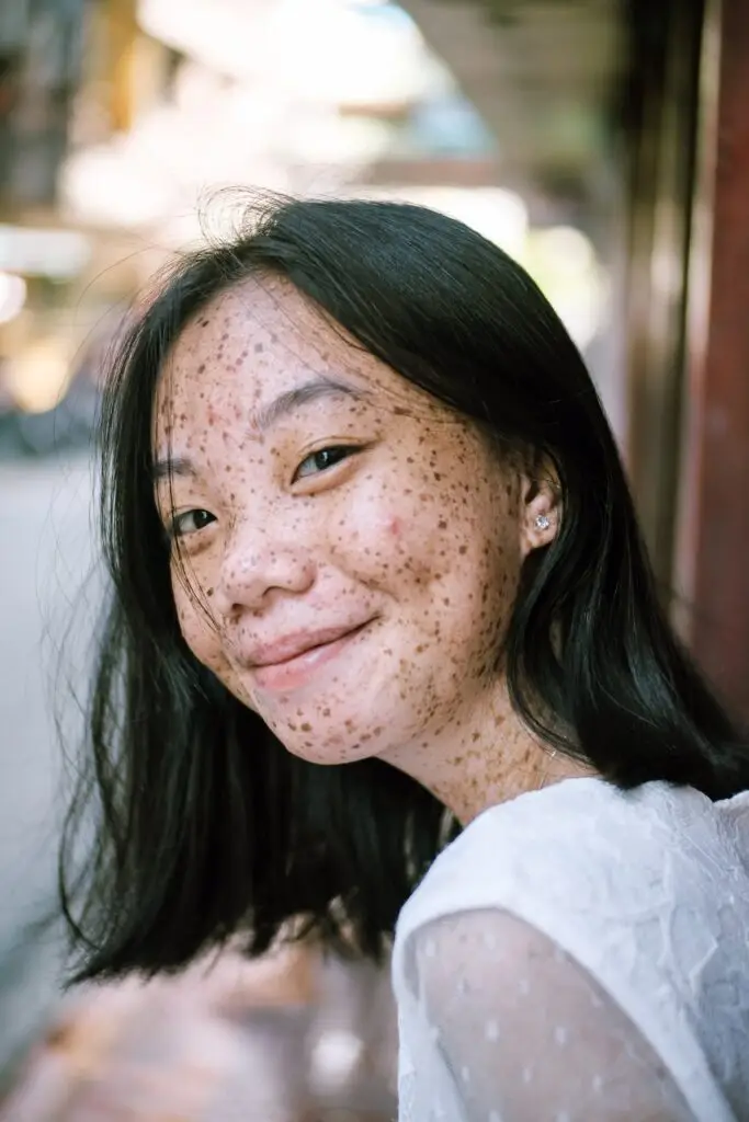 An Asian girl smiling