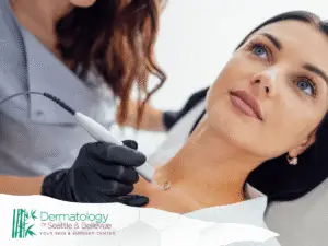A woman receives a cosmetic skin treatment on her neck.