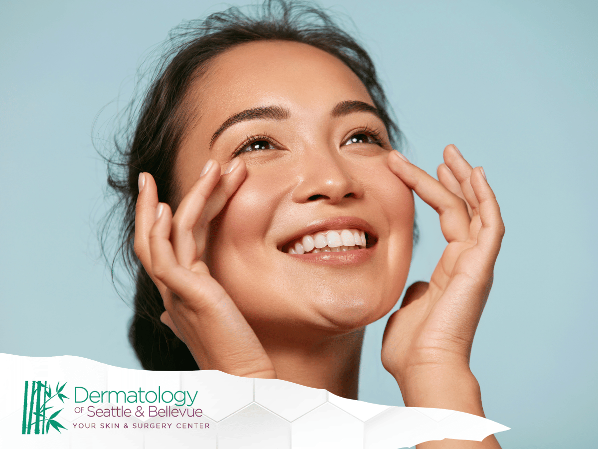 Smiling woman applying skincare product to her face.